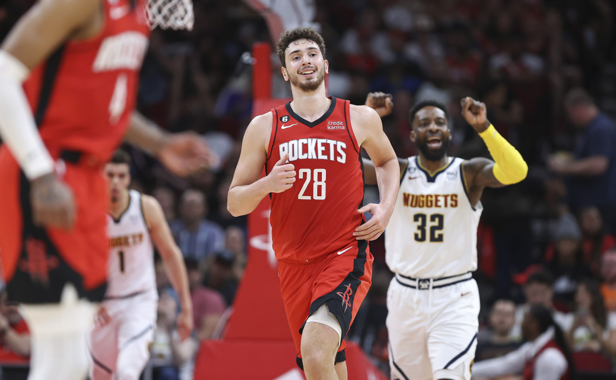 Apr 4, 2023; Houston, Texas, USA; Houston Rockets center Alperen Sengun (28) and Denver Nuggets forward Jeff Green (32) react after a play during the third quarter at Toyota Center. Mandatory Credit: Troy Taormina-USA TODAY Sports